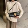 Women's Cans Buckle Minimal Long Baguette Bags