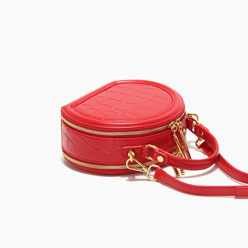Women's Stone Grain Round Crossbody Handbag in Red