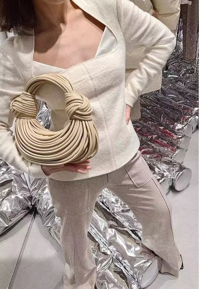 Women's Genuine Leather Noodles Clutch Bags photo review