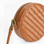 Women's Brown Woven Crossbody Round Purse in Genuine Leather