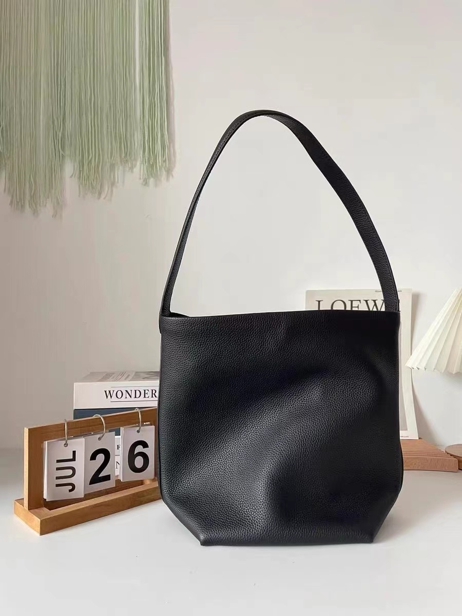 Women's Minimalist Genuine Leather Single Shoulder Bucket Bag photo review