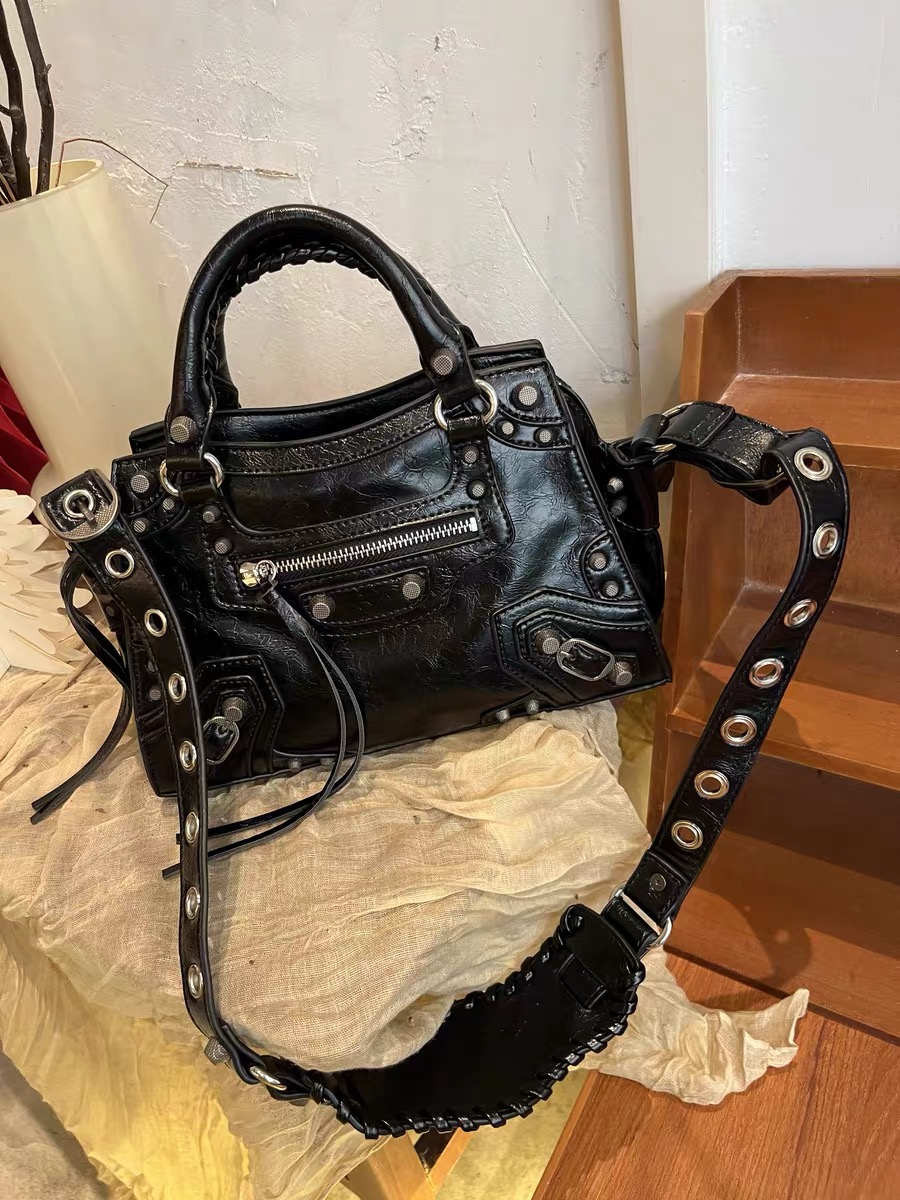 Women's Genuine Leather Studded Zipper Top Handle Bag photo review