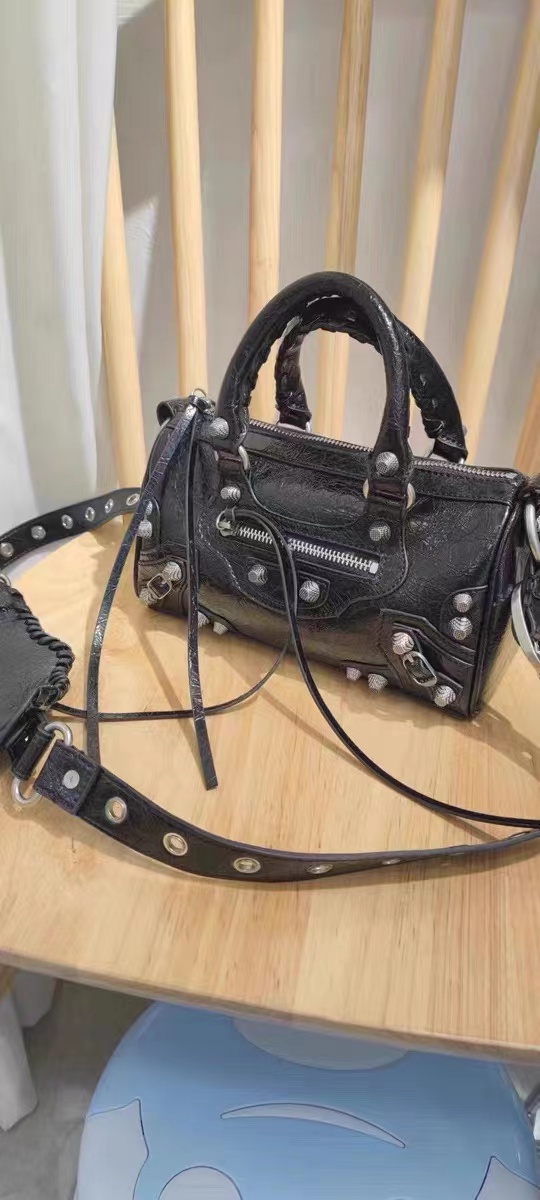 Women's Genuine Leather Studded Zipper Top Handle Bag photo review