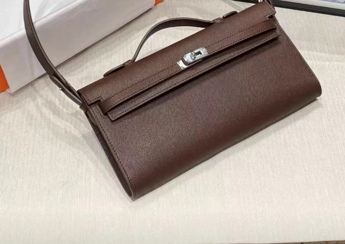 Women's Genuine Leather Top Handle Lock Closure Clutch Bag photo review