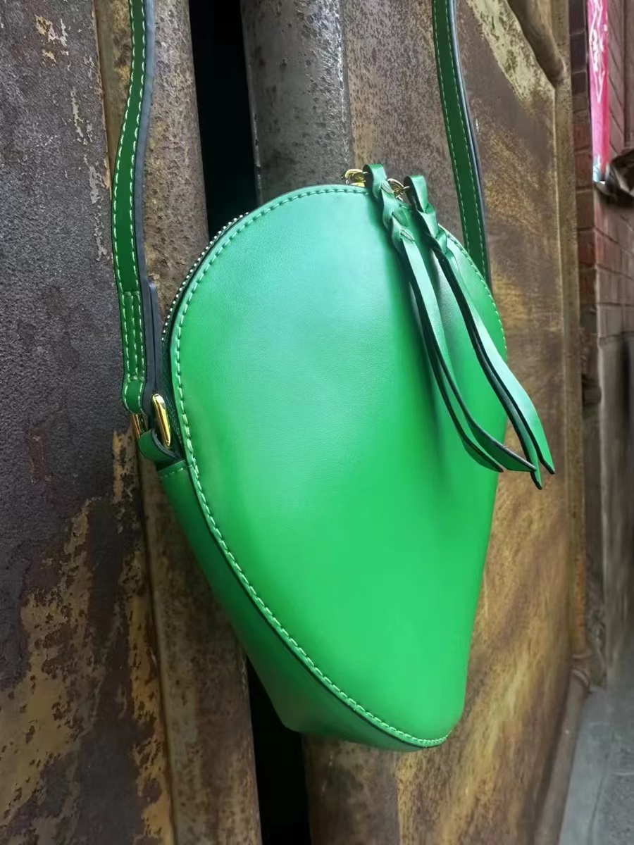 Women's Irregular Ellipse Mini Shoulder Bags in Vegan Leather photo review