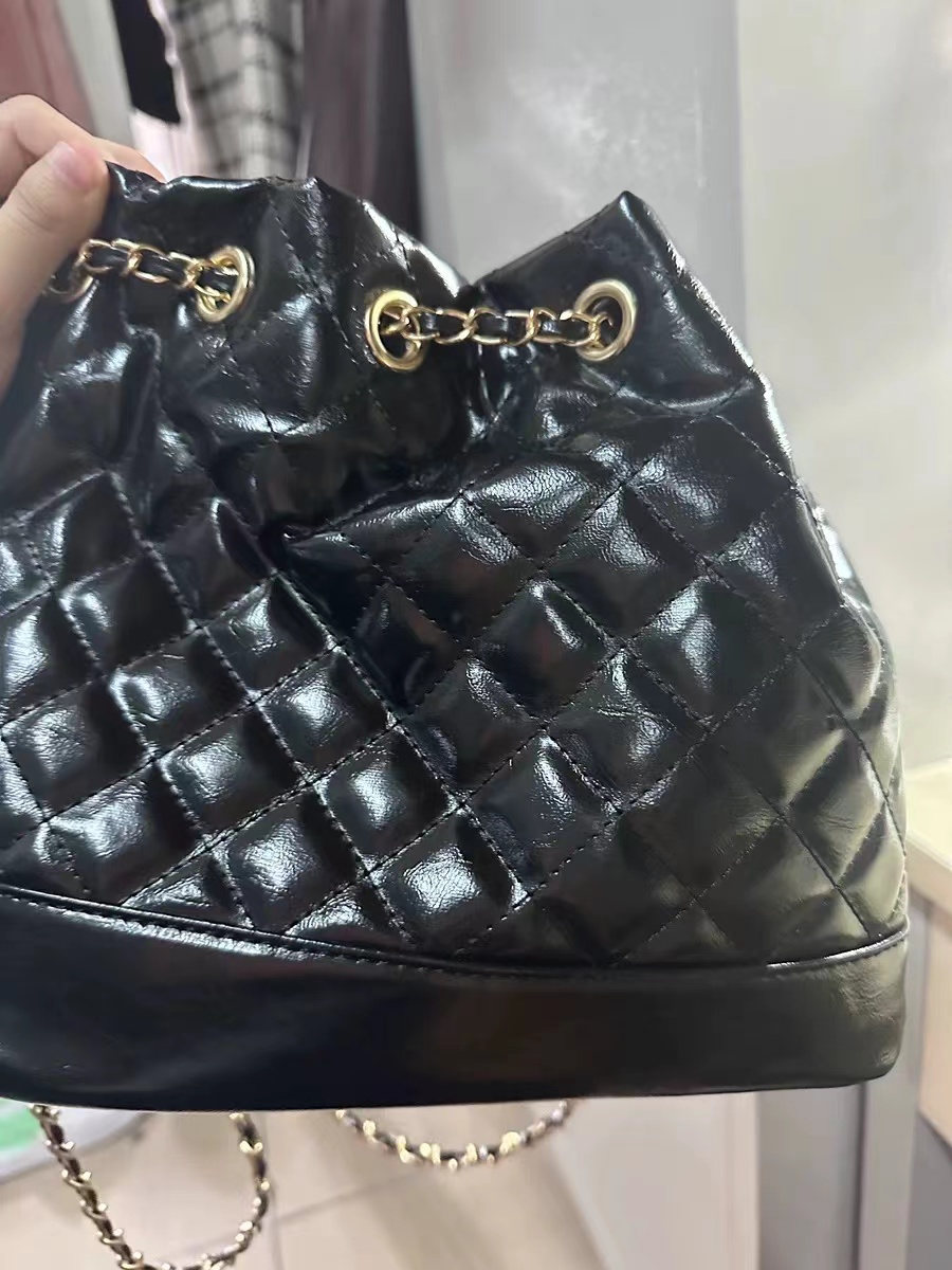 Women's Quilted Genuine Leather Crossbody Bucket Bags in Black photo review