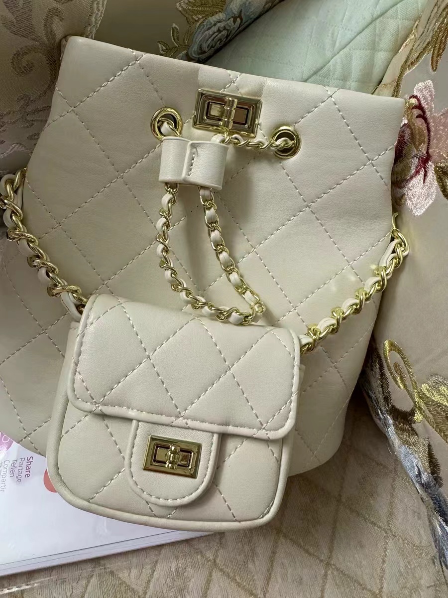 Women's Genuine Leather Quilted Chain Backpack Bucket Bag photo review