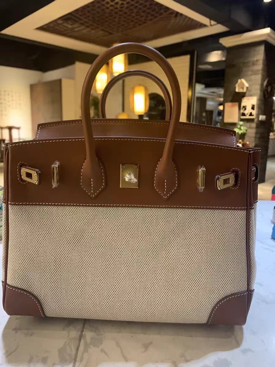 Women's Brown And White Leather Canvas Top Handle Bag photo review