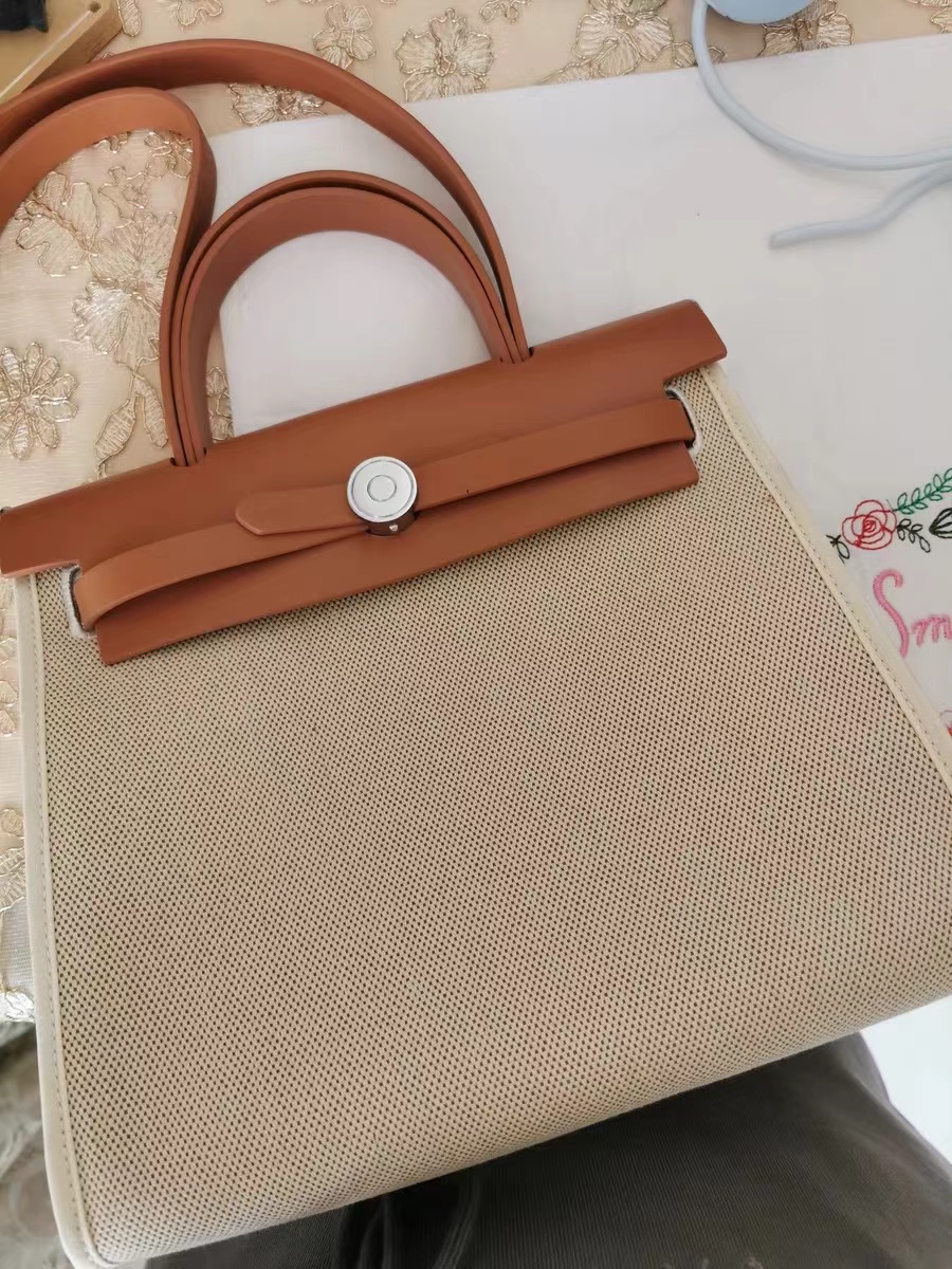 Women's Canvas Lock Buckle Crossbody Top Handle Bag photo review