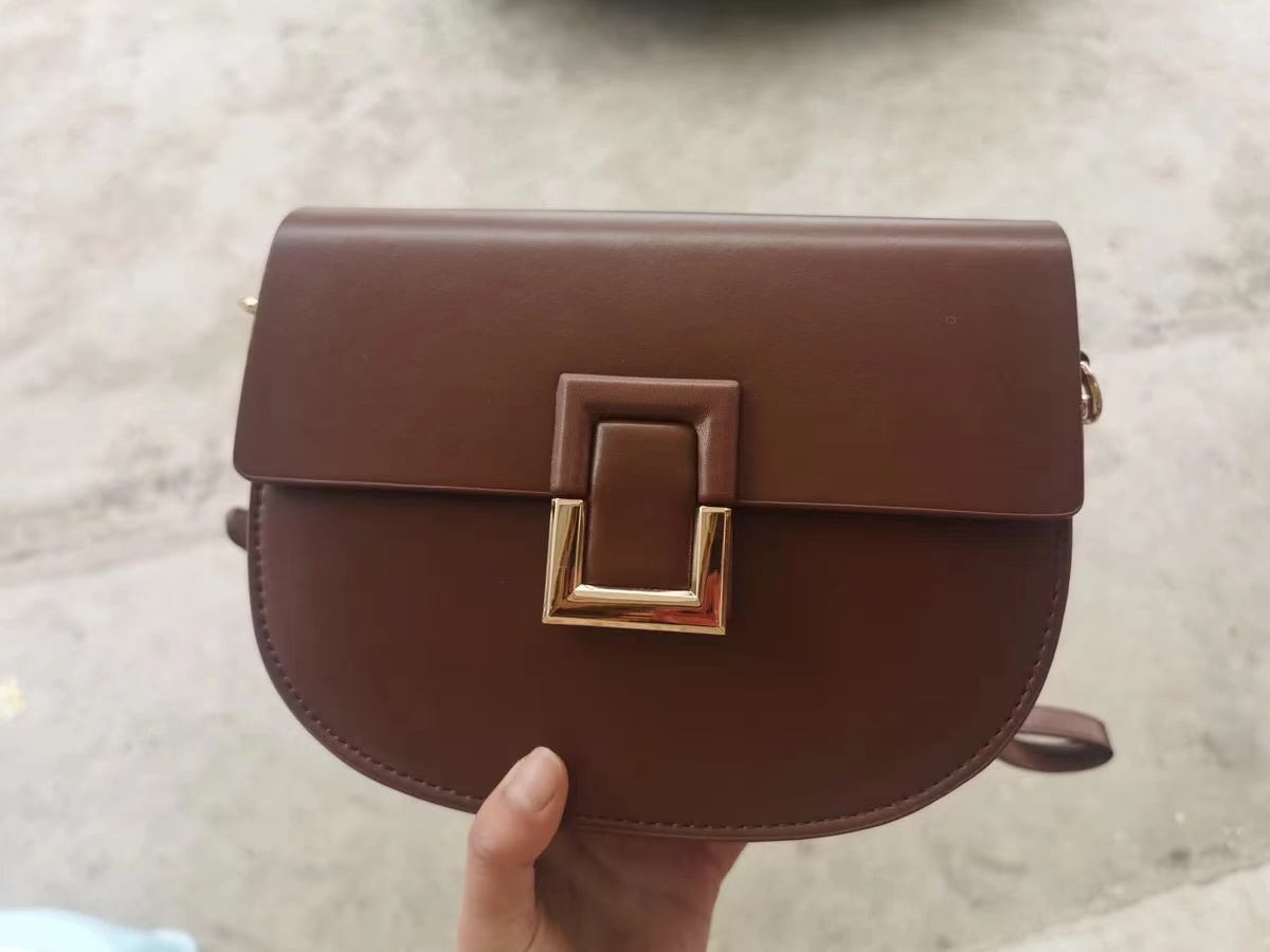 Women's Genuine Leather Vintage Lock Buckle Crossbody Zipper Saddle Bag photo review