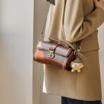 Women's Vintage Genuine Leather Crossbody Top Handle Bag with Lock Closure