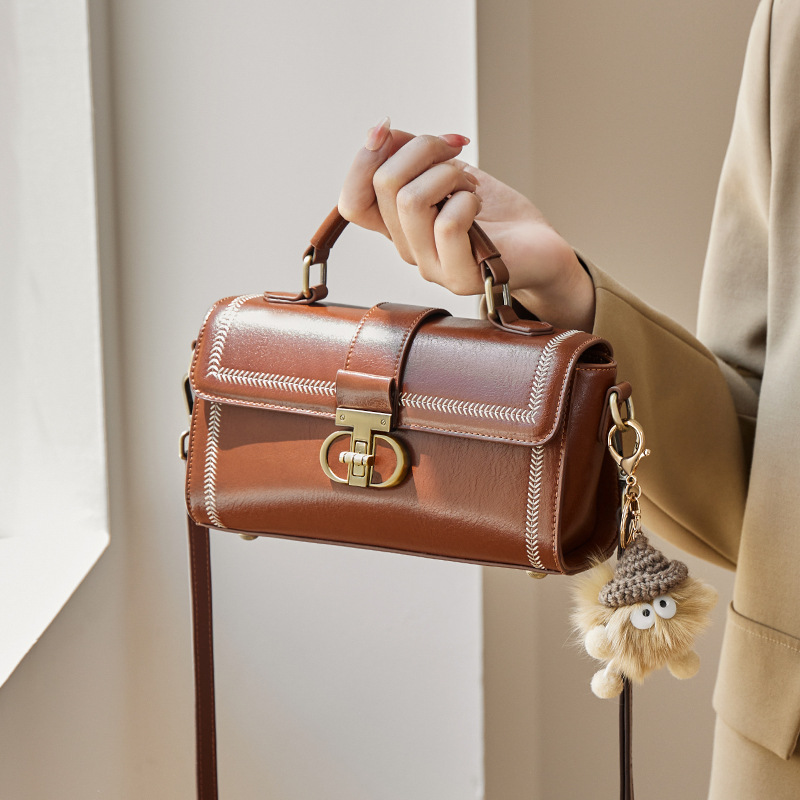 Women's Vintage Genuine Leather Crossbody Top Handle Bag with Lock Closure
