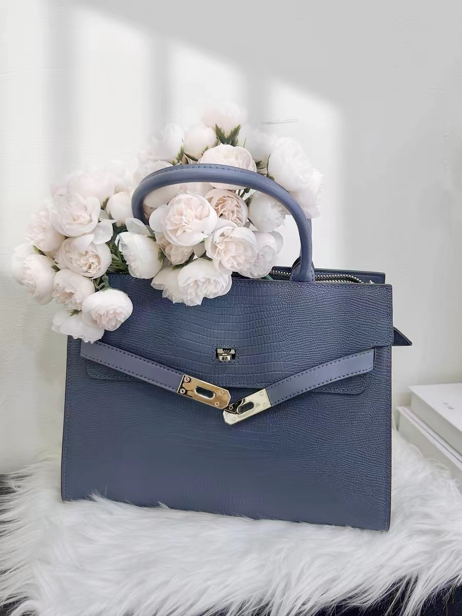 Women's Genuine Leather Lizard Pattern Top Handle Crossbody Bag with Lock Closure photo review