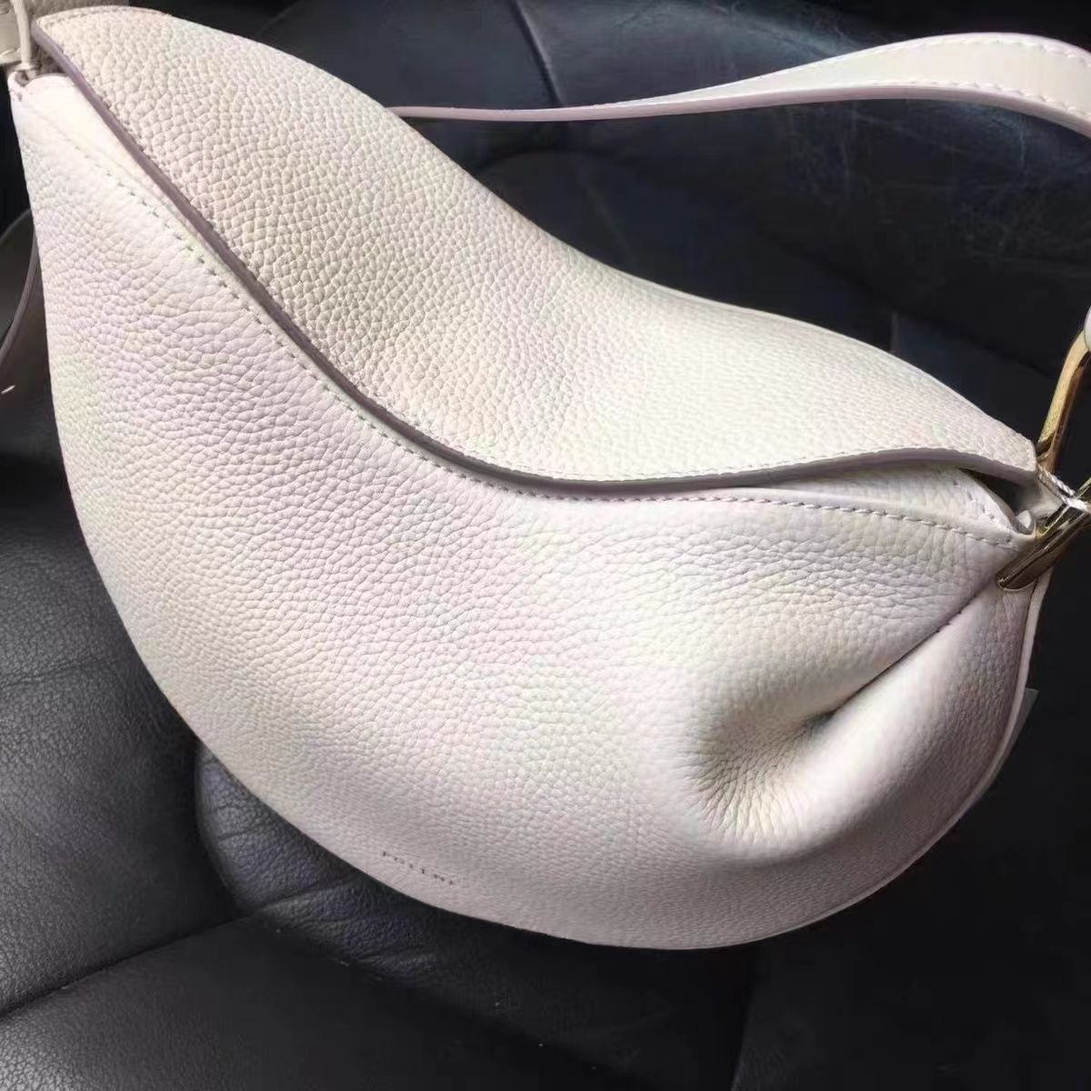 Women's Genuine Leather Lychee pattern Pea Shaped Crossbody Saddle Bag photo review