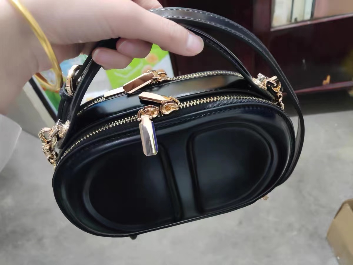 Women's Genuine Leather Minimalist Oval Box Crossbody Chain Handbag photo review