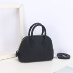 Sac à main en cuir véritable à fermeture éclair en forme de coquillage pour femmes