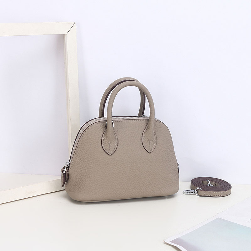 Sac à main en cuir véritable à fermeture éclair en forme de coquillage pour femmes