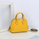 Sac à main en cuir véritable à fermeture éclair en forme de coquillage pour femmes