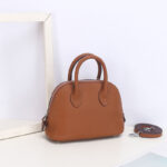 Sac à main en cuir véritable à fermeture éclair en forme de coquillage pour femmes
