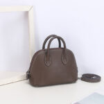 Sac à main en cuir véritable à fermeture éclair en forme de coquillage pour femmes