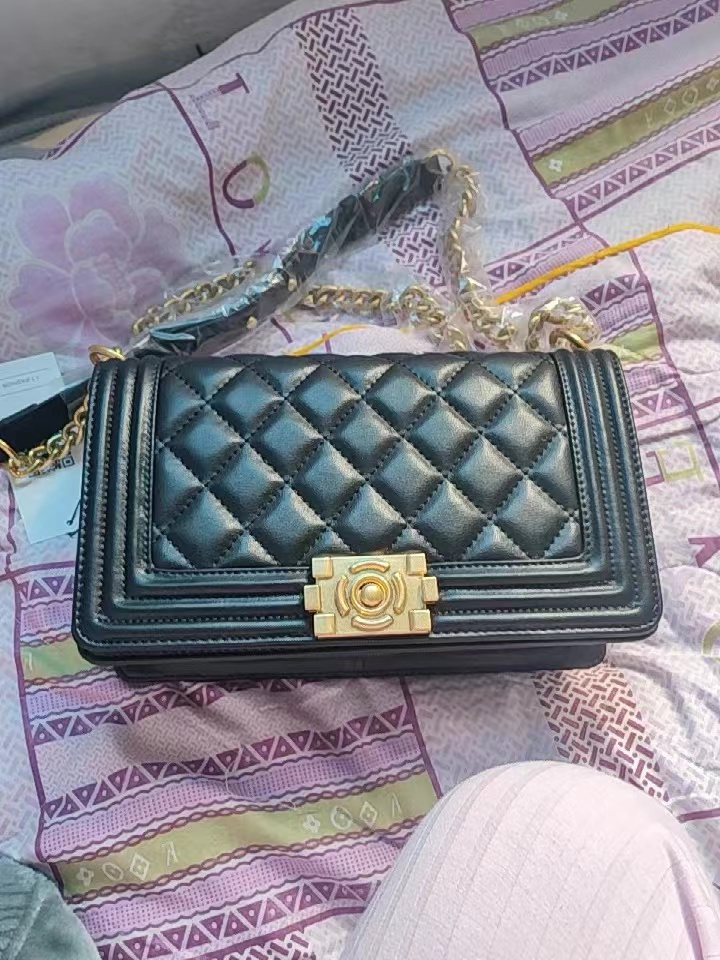 Women's Black Quilted Leather Chain Lock Crossbody Bag photo review