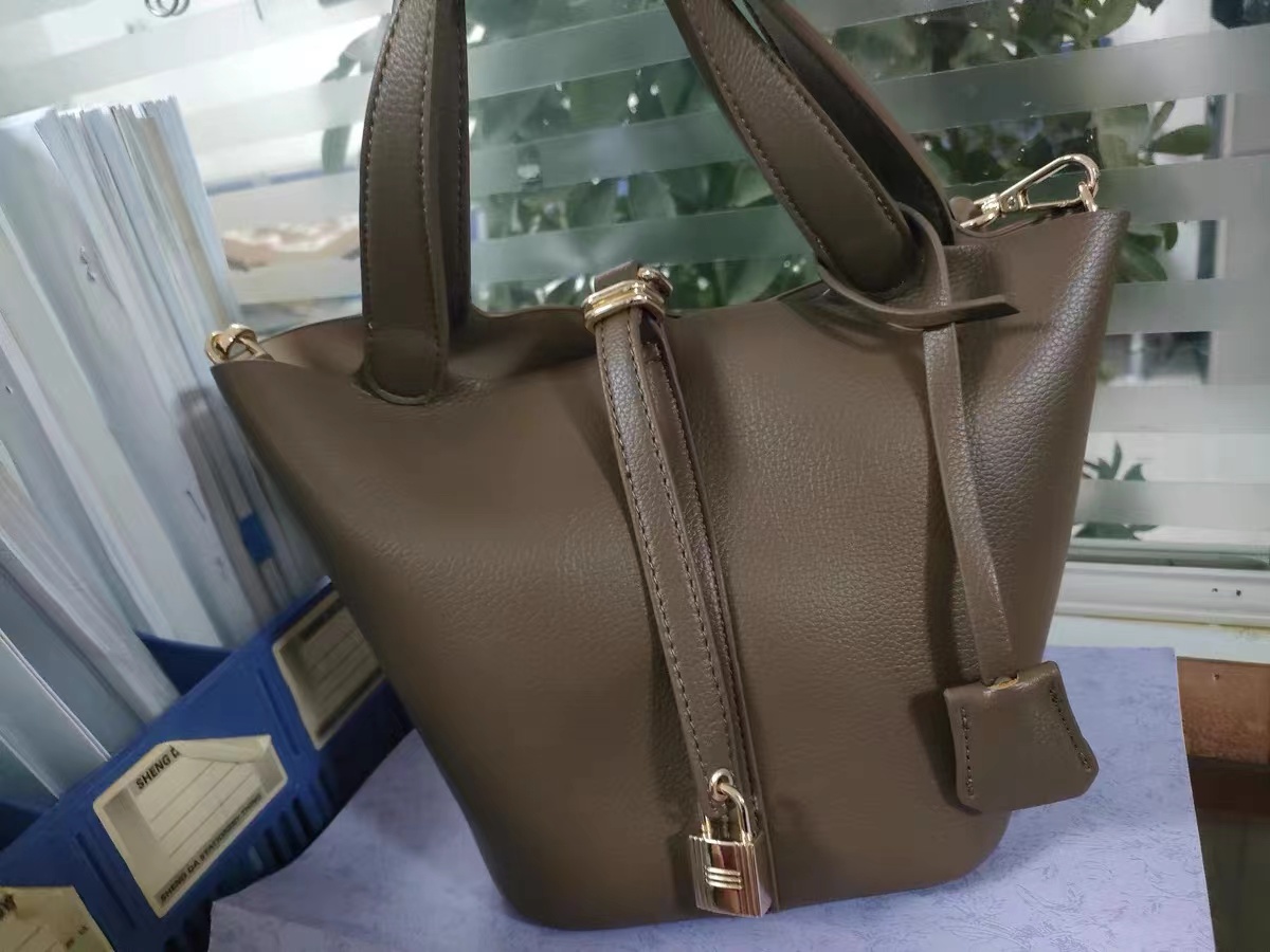 Women's Mini PU Material Lock Buckle Crossbody Tote Bucket Bag photo review