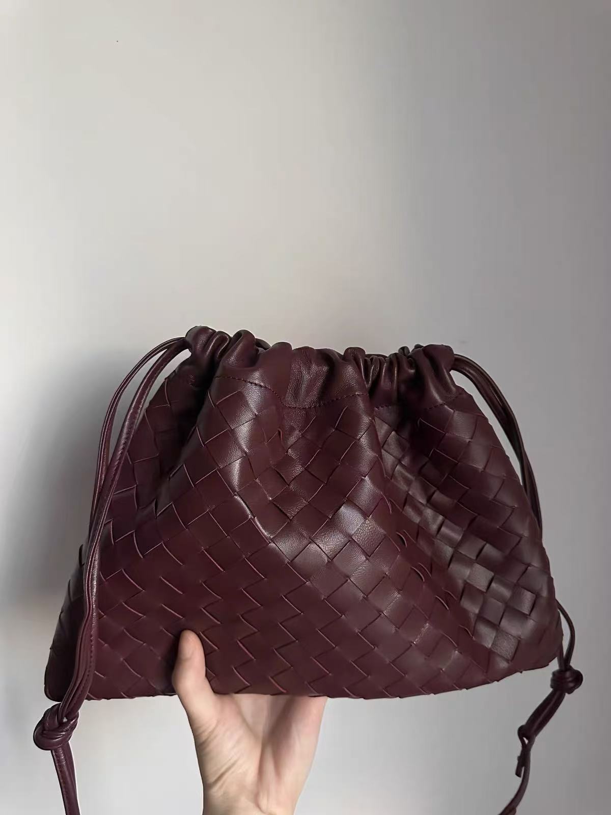 Women's Vintage Woven Leather Drawstring Cloud Crossbody Bag photo review
