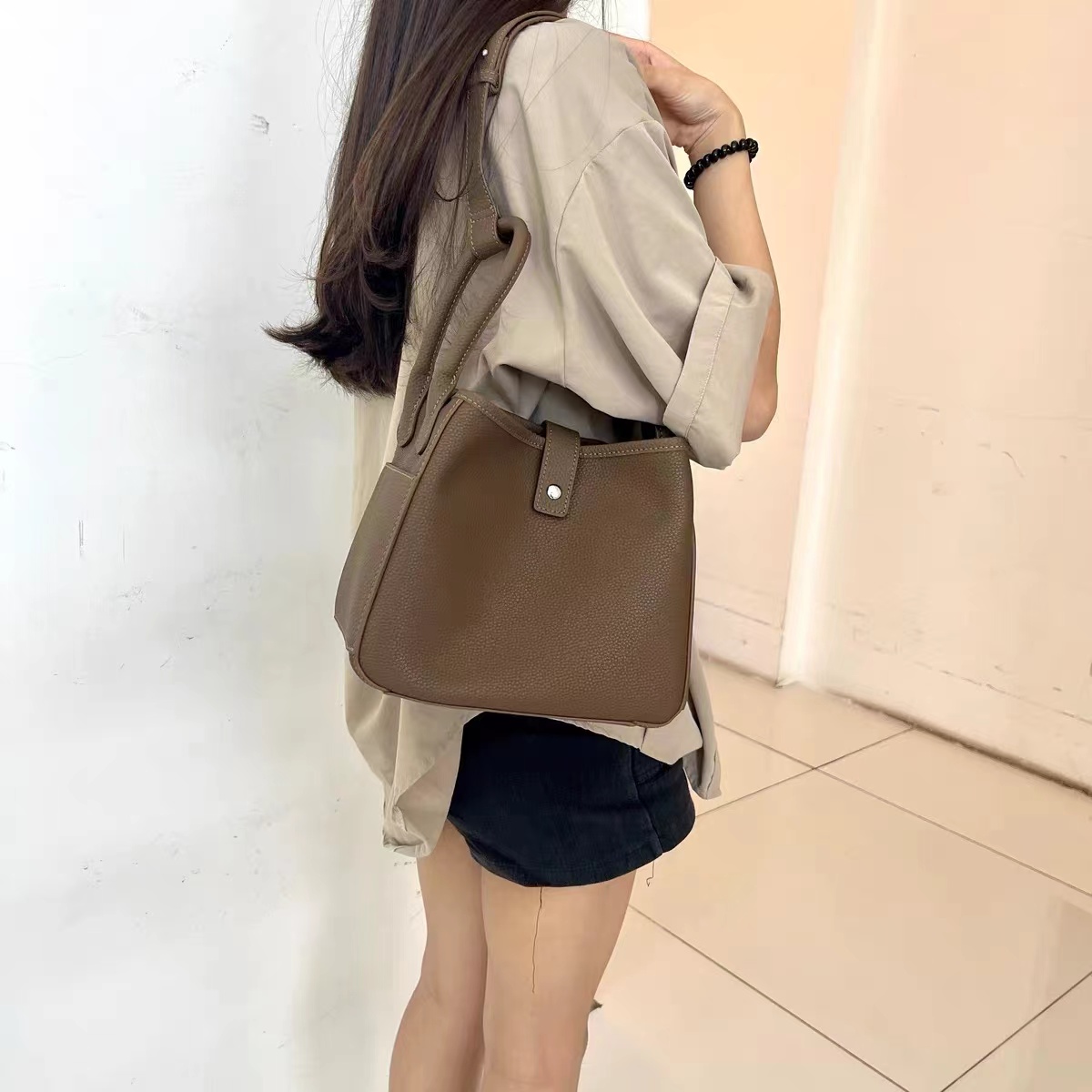 Women's Genuine Leather Crossbody Bucket Bags With Magnetic Closure photo review