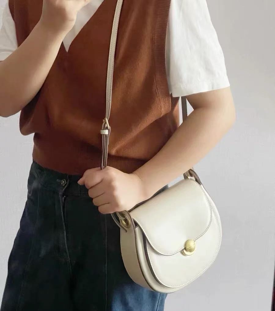 Women's Minimalist Genuine Leather Crossbody Saddle Bag photo review