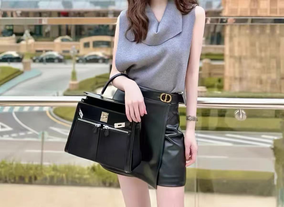 Women's Minimalist Genuine Leather Dual Zipper Pocket Lock Closure Top Handle Bag photo review