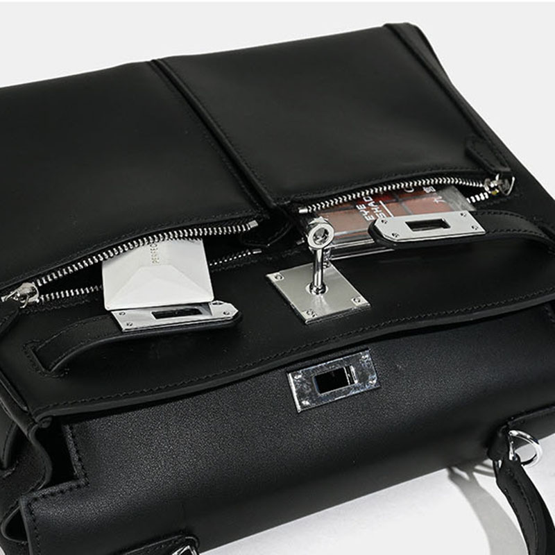 Minimalistische Damen Tasche aus echtem Leder mit zwei Reißverschlusstaschen und Verschluss am oberen Griff
