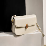 Women's Minimalist Genuine Leather Lock Flap Crossbody Baguette Bag