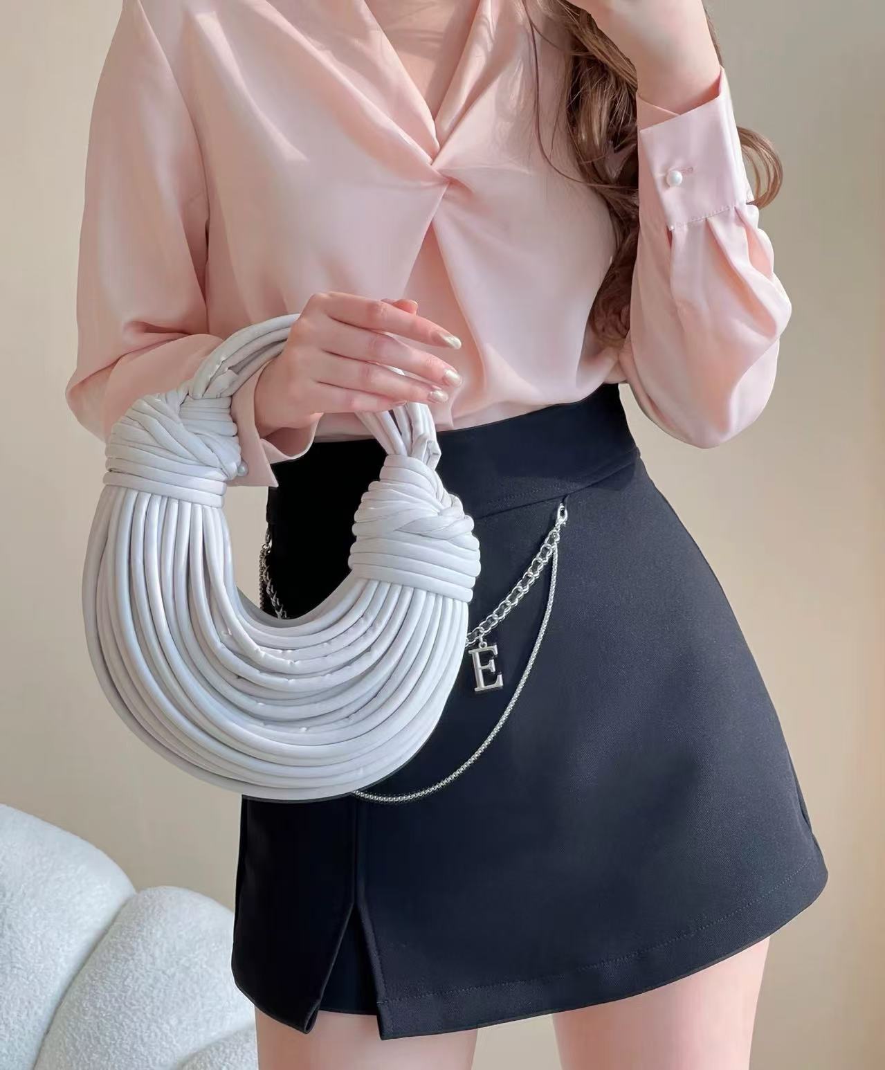 Women's Genuine Leather Noodles Clutch Bags photo review