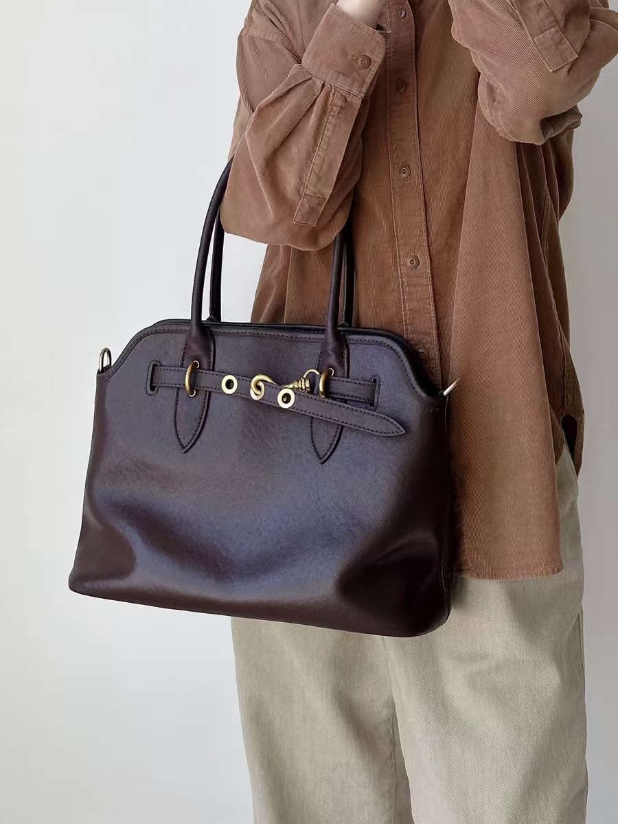 Women's Vintage Genuine Leather Drawstring Lock Shell Crossbody Strap Tote Bag photo review