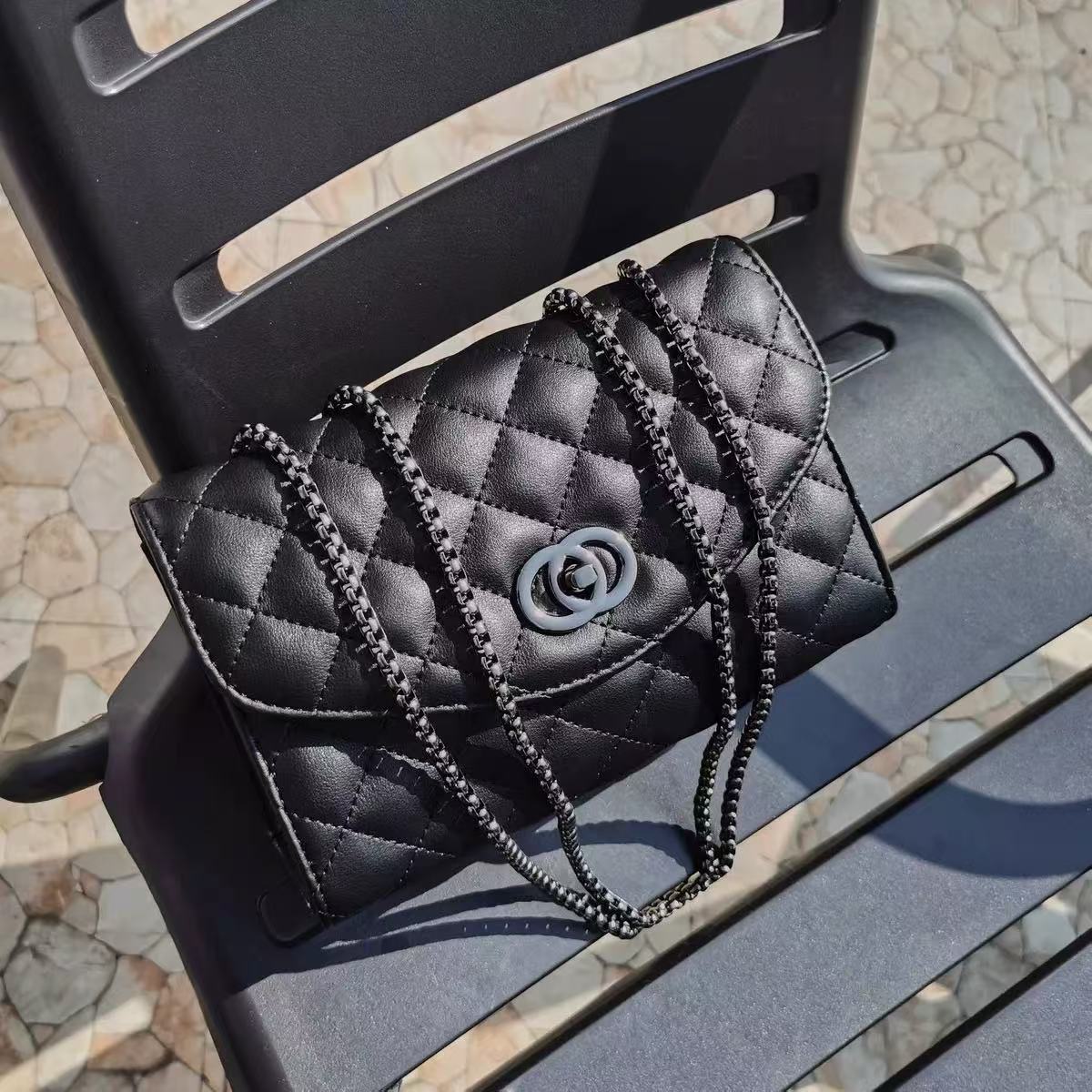 Women's Quilted Genuine Leather Rotating Lock Chain Shoulder Crossbody Bag photo review