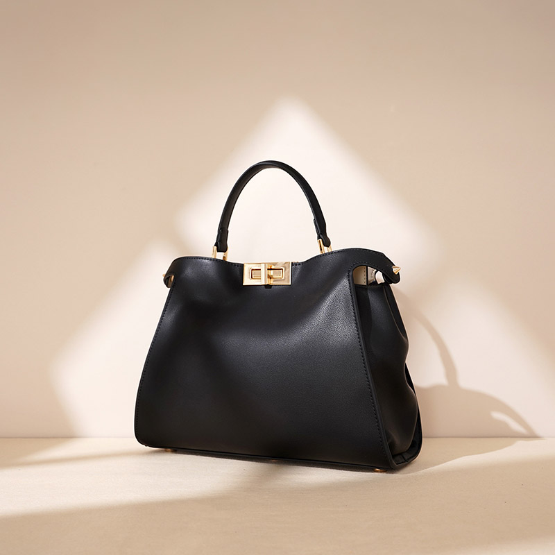 Minimalistische Damen Leder Twist-Lock Crossbody Handtasche