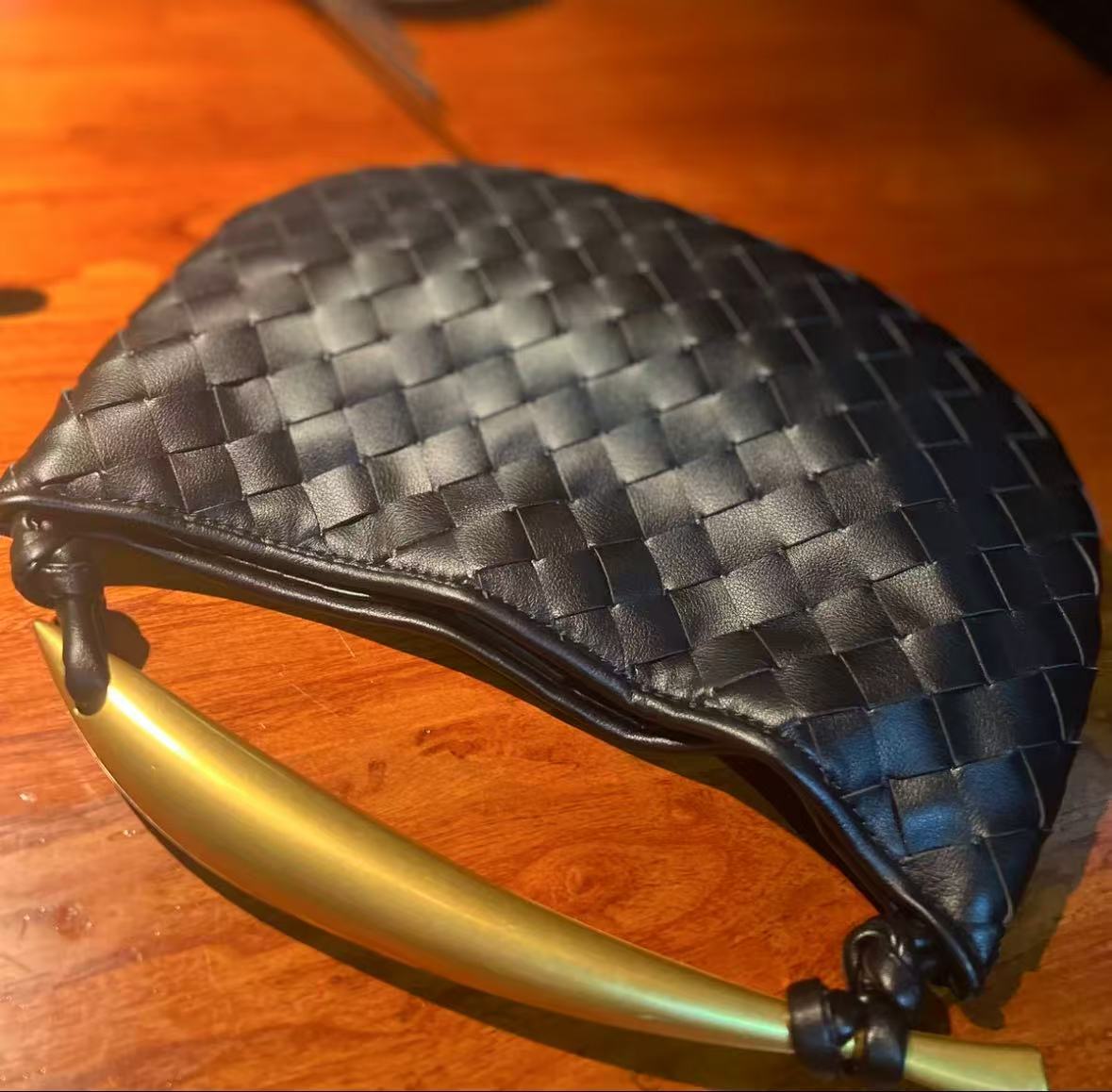 Women's Woven Dumpling Clutch Bag photo review