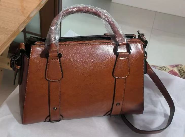 Women's Genuine Leather Pillow Shape Zipper Closure Crossbody Shoulder Handbags photo review