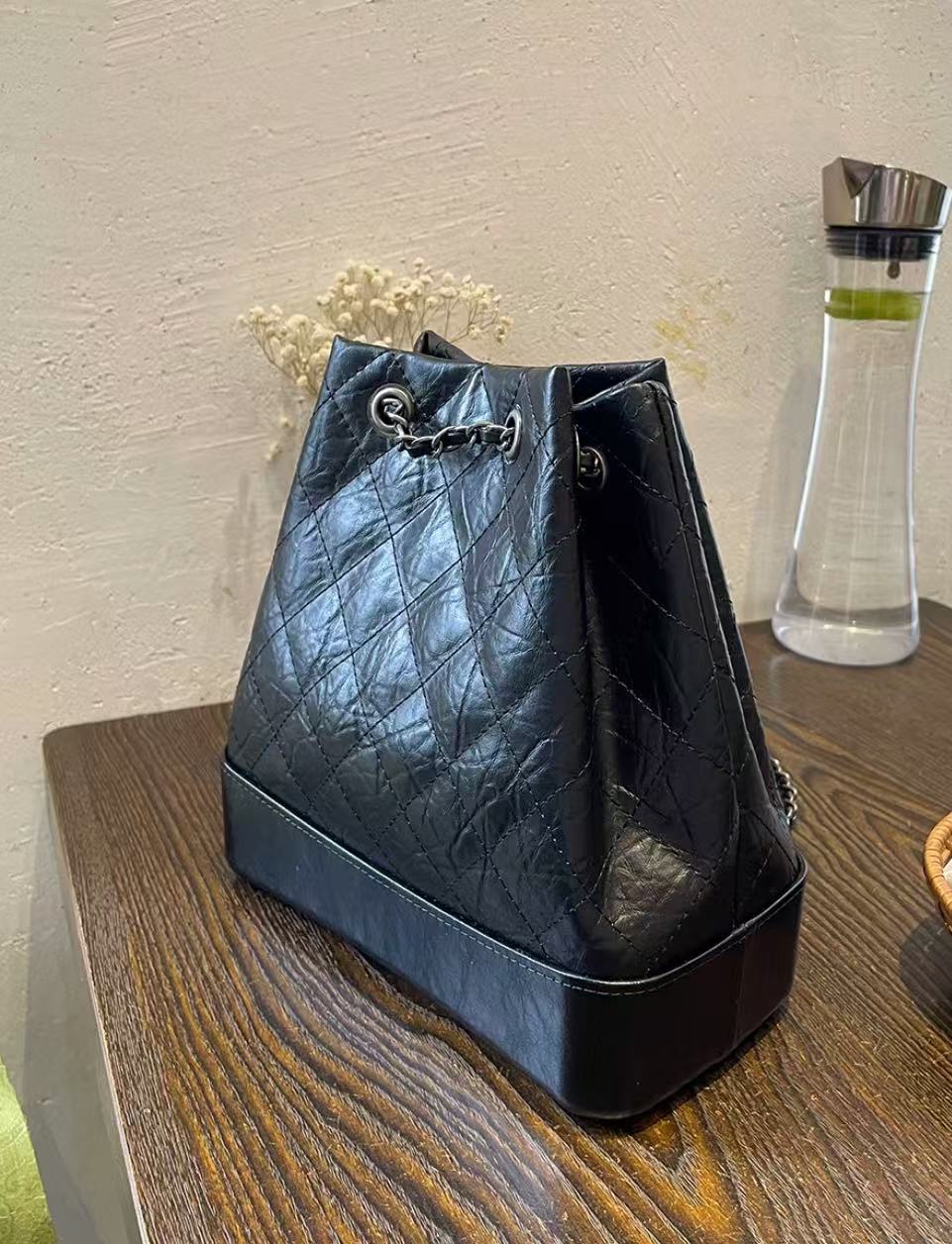 Women's Quilted Genuine Leather Crossbody Bucket Bags in Black photo review