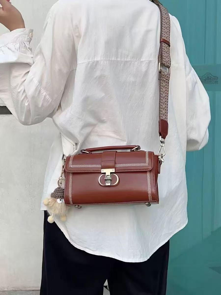Women's Vintage Genuine Leather Crossbody Top Handle Bag with Lock Closure photo review