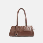 Minimalistische Baguette-Tasche aus echtem Leder in Kissenform für Damen