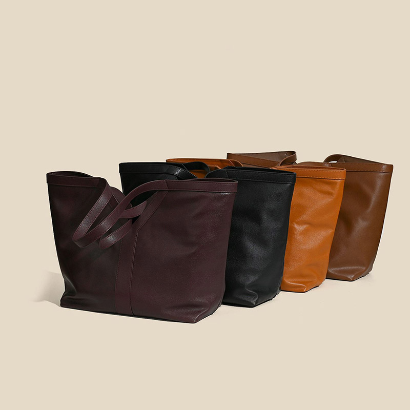 Minimalistische V-förmige Tote Tasche aus echtem Leder für Damen
