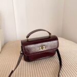 Women's Vintage Genuine Leather Embossed Lock-Clasp Crossbody Top Handle Bag photo review