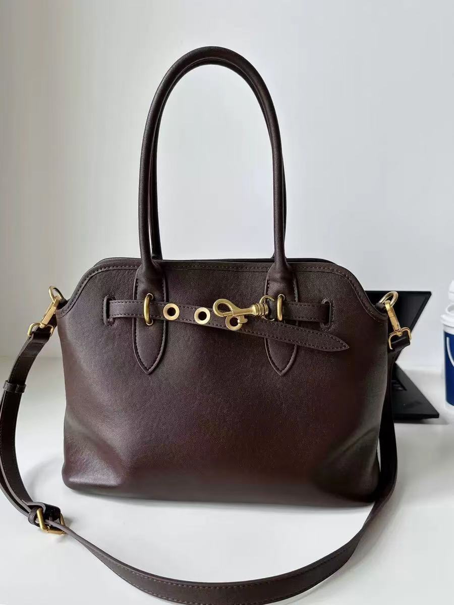 Women's Vintage Genuine Leather Drawstring Lock Shell Crossbody Strap Tote Bag photo review
