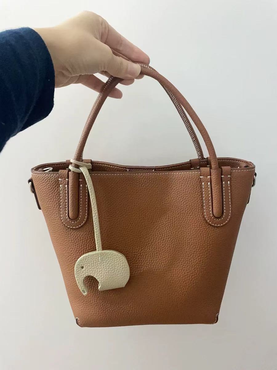 Women's Minimalist Genuine Leather Shoulder Bucket Bag photo review