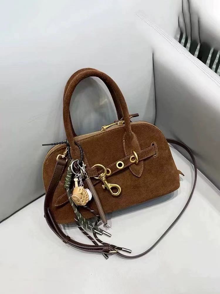 Women's Vintage Suede Genuine Leather Drawstring Handbag photo review