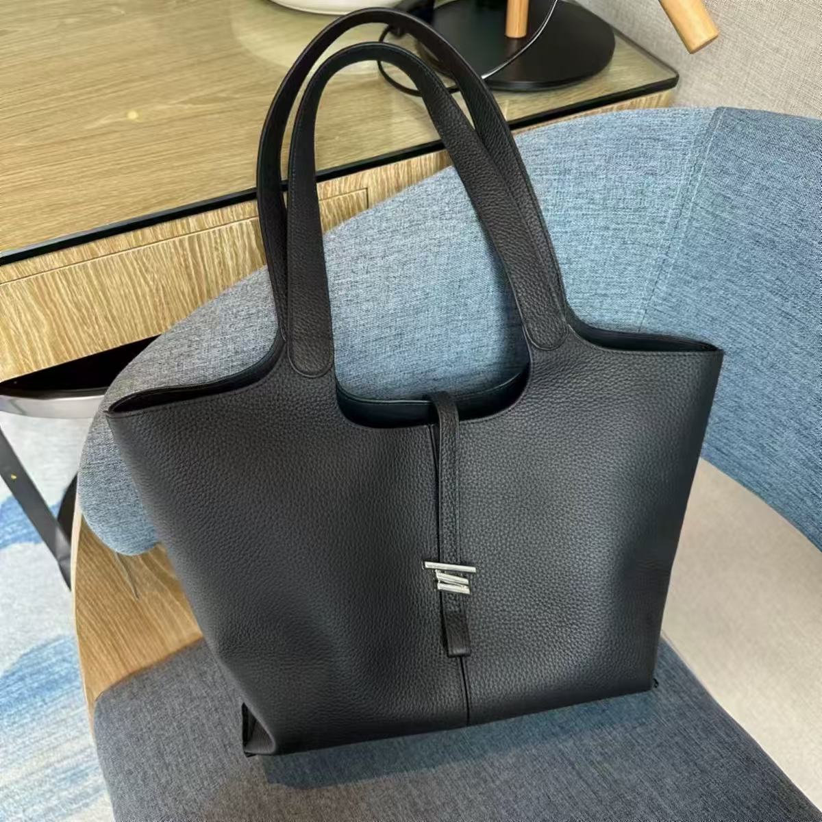 Women's Minimalist Genuine Leather Tote Bag with Clasp Detail photo review