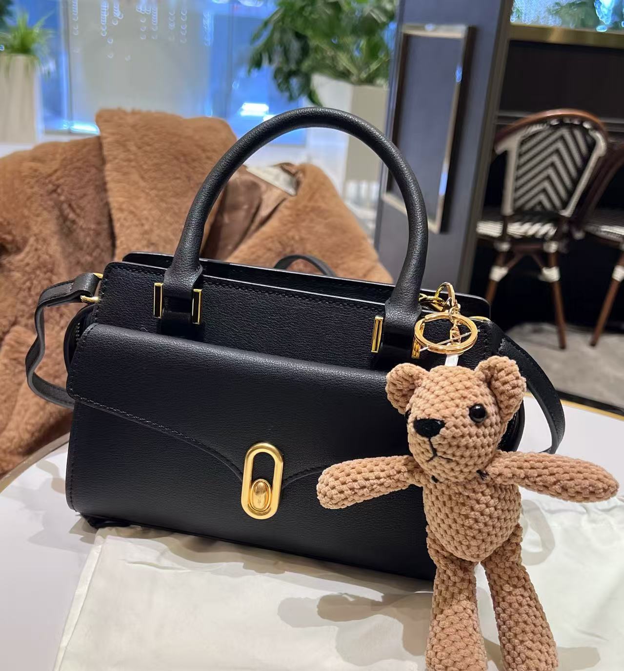 Damen Vintage Echtleder Schloss Schnalle Reißverschluss Crossbody Umhängetaschen photo review