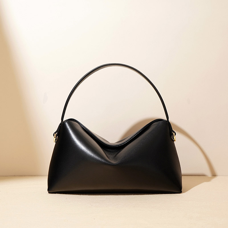 Minimalistische Handtasche aus echtem Leder in Knödelform für Damen