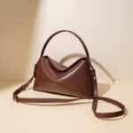 Minimalistische Handtasche aus echtem Leder in Knödelform für Damen